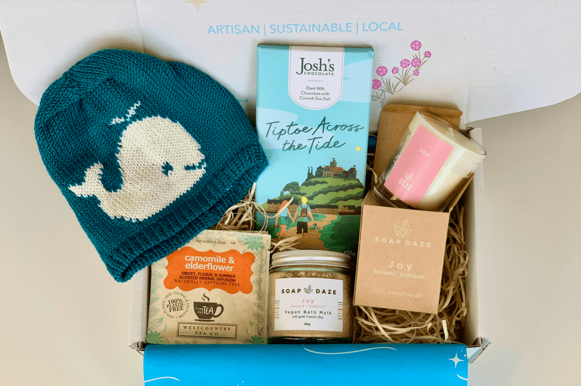 Mother and Baby Gift Set from Sand and Sparkle, Eco friendly with merino wool baby beanie made in Cornwall, artisan Cornish chocolate, a 'Joy' candle and bath salts made in Devon and Chamomile tea bags