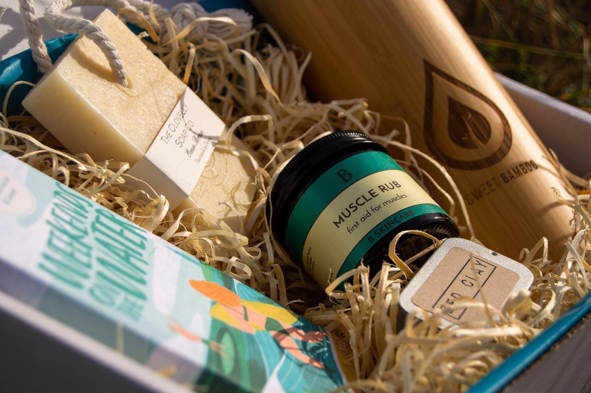 Sand and Sparkles Outdoors Luxury Gift Box with Cornish bamboo flask, Devon handmade vegan soap on a rope, Cornish handmade sunscreen and Cornish chocolate